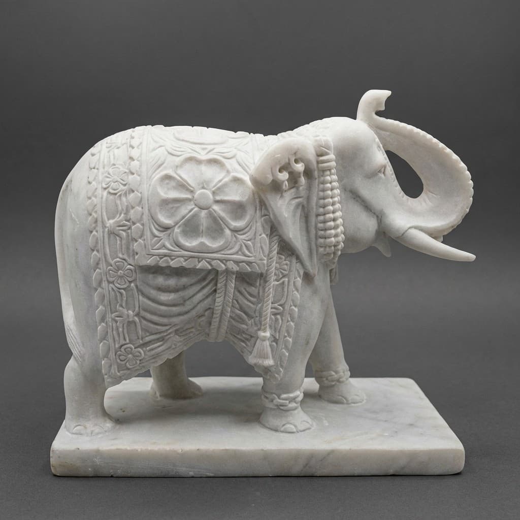 Hand-Carved Artisan Elephant Statue with Intricate Floral Engravings - hero-light